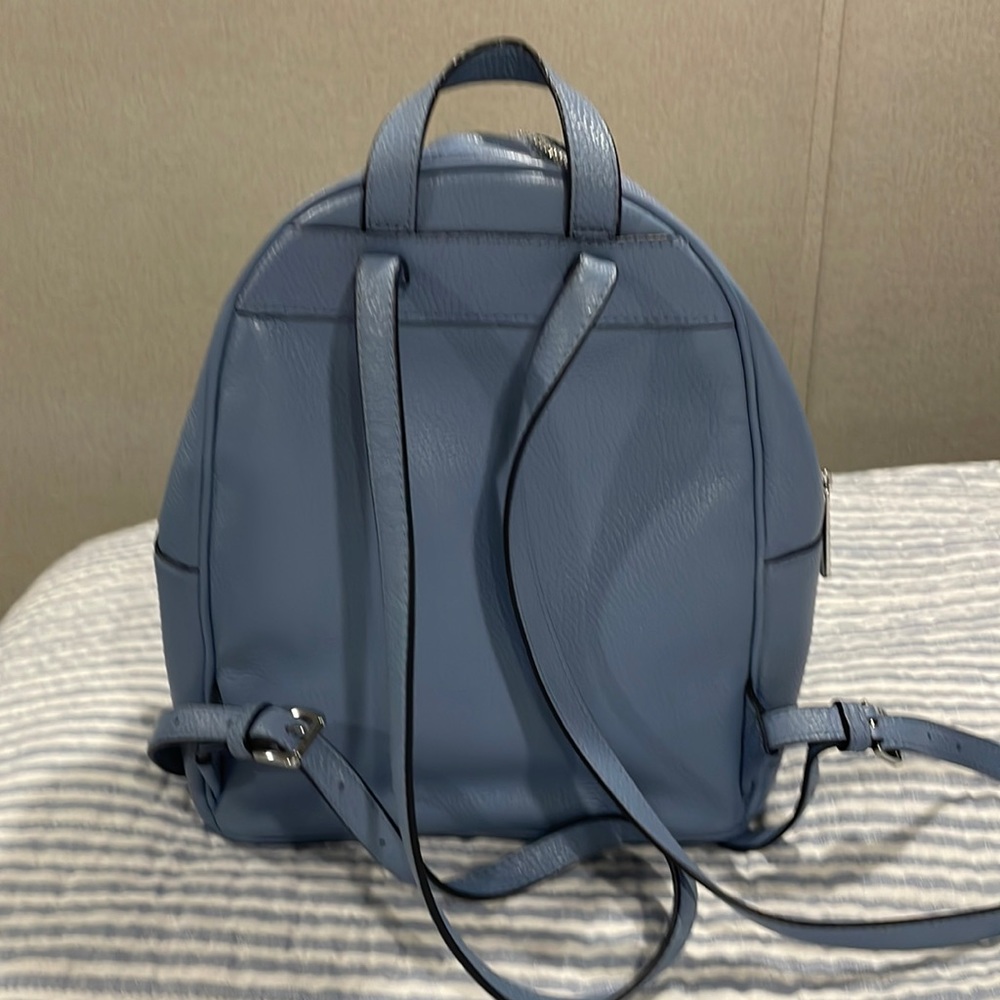 I am selling a brand new Michael Kors pack back.